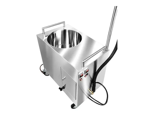 Pour X-Press 3000 with the lid off, showing the round stainless melt tank