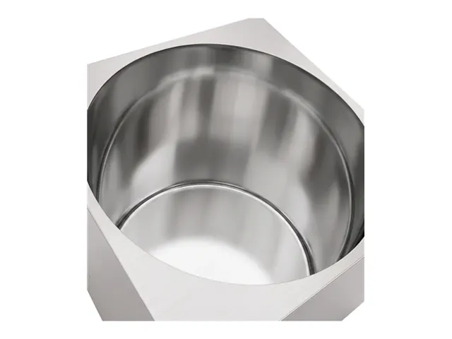 Inside a large PRIMO round melter: one continuous polished stainless wall with no corners
