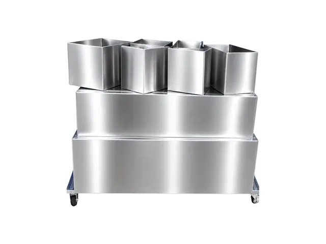 Wax hands machine with its removable stainless chambers lifted out
