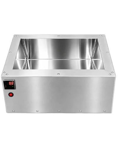 Open WaxMelters polished stainless steel tank showing the gleaming interior